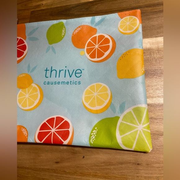 Thrive Causemetics Blue Makeup Travel Case with Fruit Design - Picture 9 of 9